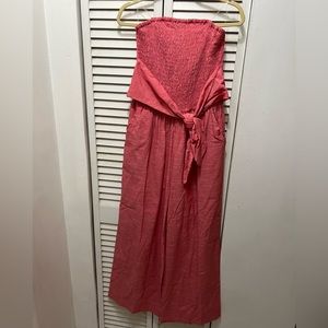 NWT pink jumpsuit elastic top 14 inches from armpit to armpit & 50 inches long
